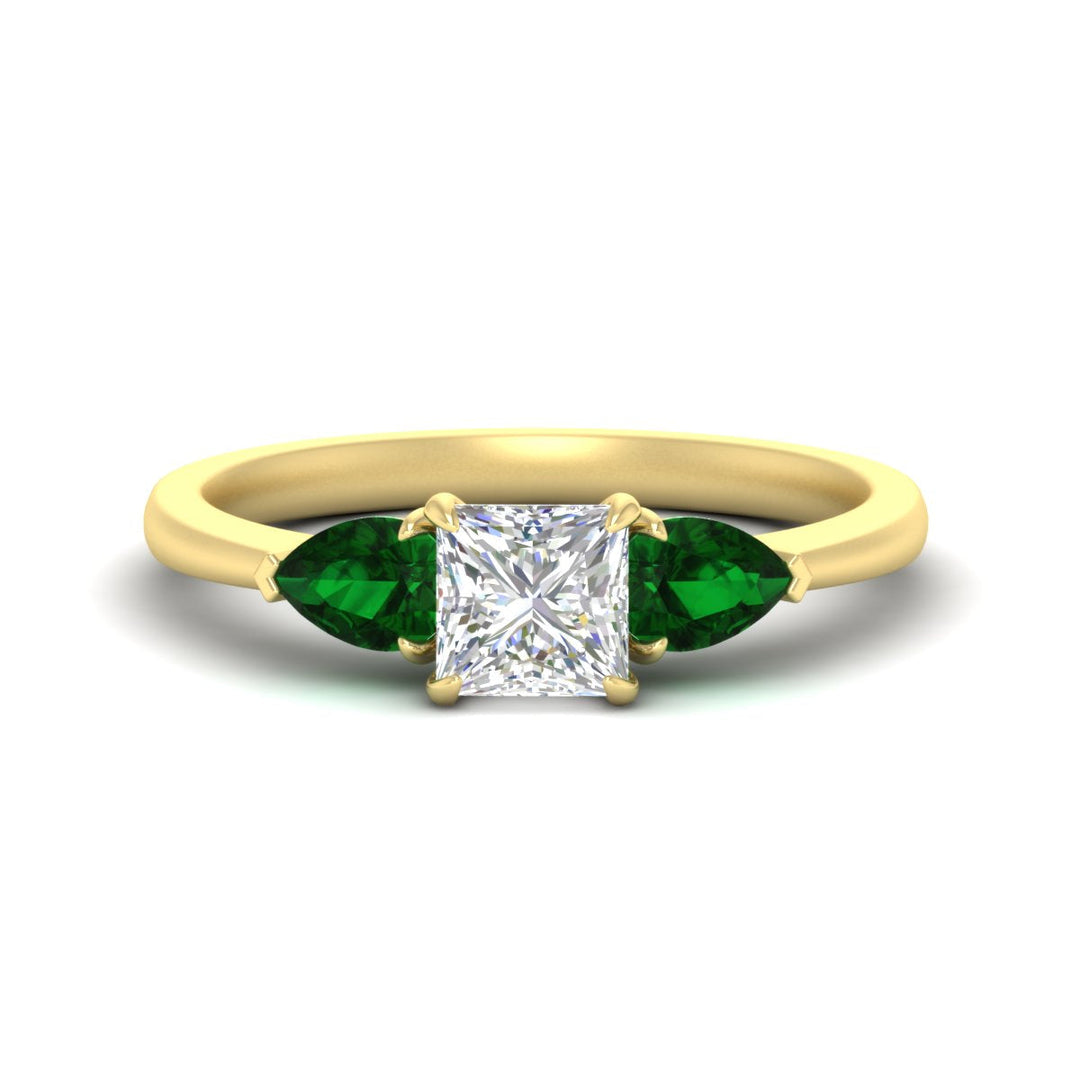 pear-diamond-cathedral-princess-cut-engagement-ring-with-emerald-in-yellow-gold-fdenr9210prrgemgrsleep-nl-yg_310ef70c-eb95-4938-b7d0-6d00c13a34c4.jpg?v=1758084928