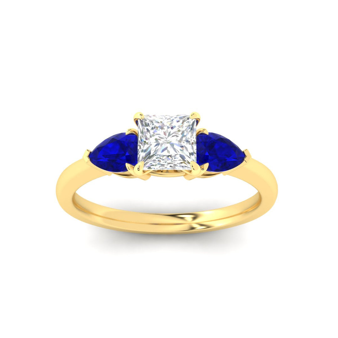 pear-diamond-cathedral-princess-cut-engagement-ring-with-sapphire-in-yellow-gold-fdenr9210prrgsablangle5-nl-yg.jpg?v=1758084928
