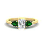Load image into Gallery viewer, pear-diamond-cathedral-radiant-cut-engagement-ring-with-emerald-in-yellow-gold-fd-enr9210rargemgrsleep-nl-yg.jpg?v=1758086159
