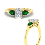 Load image into Gallery viewer, pear-diamond-cathedral-radiant-cut-engagement-ring-with-emerald-in-yellow-gold-fdenr9210rargemgrangle3-nl-yg
