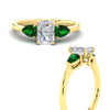 Load image into Gallery viewer, pear-diamond-cathedral-radiant-cut-engagement-ring-with-emerald-in-yellow-gold-fdenr9210rargemgrangle3-nl-yg.jpg?v=1758086159