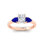 Load image into Gallery viewer, pear-diamond-cathedral-radiant-cut-engagement-ring-with-sapphire-in-rose-gold-fdenr9210rargsablangle5-nl-rg.jpg?v=1757584370
