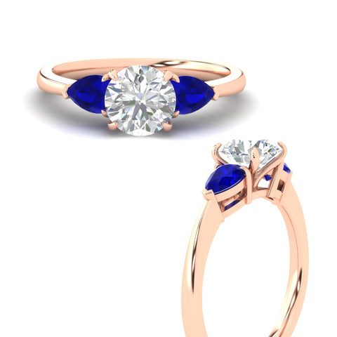 pear-diamond-cathedral-round-cut-engagement-ring-with-sapphire-in-rose-gold-fdenr9210rorgsablangle3-nl-rg?v=1758024760