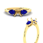 Load image into Gallery viewer, pear-diamond-cathedral-semi-mount-engagement-ring-with-sapphire-in-yellow-gold-fdenr9210smrgsablangle3-nl-yg
