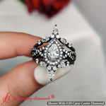Load image into Gallery viewer, Twisted Pear Halo Bridal Ring Set
