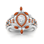 Load image into Gallery viewer, Twisted Pear Halo Bridal Ring Set
