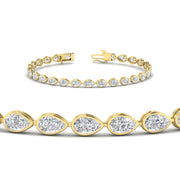 pear-shape-bezel-set-tennis-bracelet-east-west-style-in-yellow-gold-FDBECPE10581ANGLE2-5.40CT-NL-YG.jpg?v=1776849292