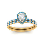 Load image into Gallery viewer, pear-shaped-blue-topaz-halo-wedding-ring-set-in-yellow-gold-FD8523PEGICBLTO-NL-YG