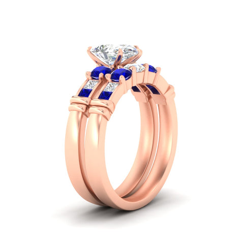 pear-shaped-bridal-ring-set-with-sapphire-princess-channel-accents-in-rose-gold-fdens286pegsablangle2-nl-rg.jpg