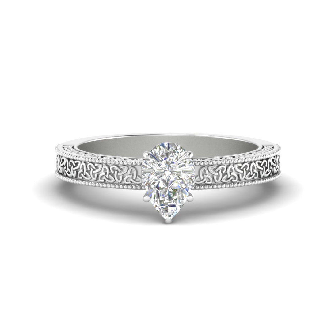 pear-shaped-celtic-engraved-solitaire-ring-in-white-gold-fdenr8544persleep-nl-wg
