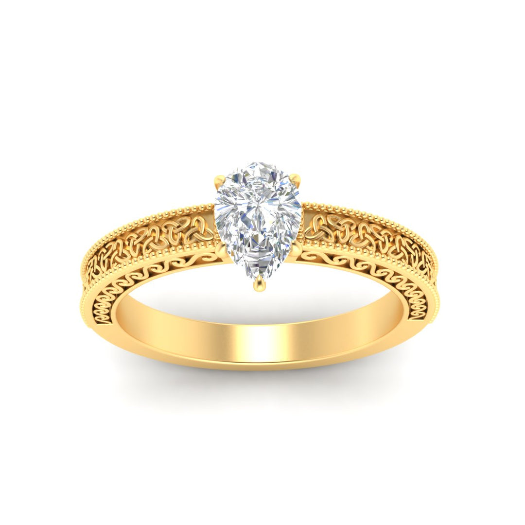 pear-shaped-celtic-engraved-solitaire-ring-in-yellow-gold-fdenr8544perangle5-nl-yg