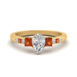 Load image into Gallery viewer, pear-shaped-channel-three-stone-diamond-engagement-ring-with-orange-sapphire-in-yellow-gold-FDENS205PERGSAOR-NL-YG.jpg
