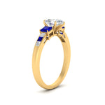 Load image into Gallery viewer, pear-shaped-channel-three-stone-diamond-engagement-ring-with-sapphire-in-yellow-gold-FDENS205PERGSABL-NL-YG.jpg
