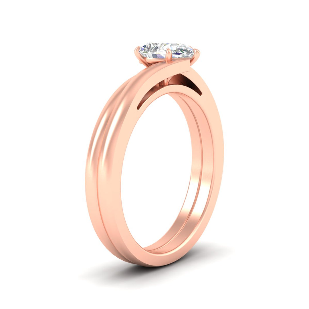 pear-shaped-diamond-serenity-solitaire-wedding-set-in-rose-gold-fdens1020peangle2-nl-rg?v=1764307630