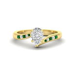 Load image into Gallery viewer, pear-shaped-diamond-swirl-channel-set-emerald-wedding-ring-in-yellow-gold-FDENS4028PERGEMGR-NL-YG_473b38e8-32fe-4b12-a557-f63ee3fcc37f.jpg?v=1754996133
