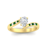 Load image into Gallery viewer, pear-shaped-diamond-swirl-channel-set-emerald-wedding-ring-in-yellow-gold-FDENS4028PERGEMGRANGLE5-NL-YG.jpg?v=1754995957