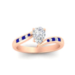 Load image into Gallery viewer, pear-shaped-diamond-swirl-channel-set-sapphire-wedding-ring-in-rose-gold-FDENS4028PERGSABLANGLE5-NL-RG_7d216799-12ab-4b46-9ab7-77f7974726d1.jpg?v=1754996128
