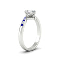 Thumbnail 29 - pear-shaped-diamond-swirl-channel-set-sapphire-wedding-ring-in-white-gold-FDENS4028PERGSABLANGLE2-NL-WG_7c7cae69-64aa-418b-aab2-400c752968ea.jpg?v=1754996129