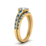 Load image into Gallery viewer, pear-shaped-graduated-channel-diamond-wedding-set-with-blue-topaz-in-FD122866PEGICBLTO-NL-YG
