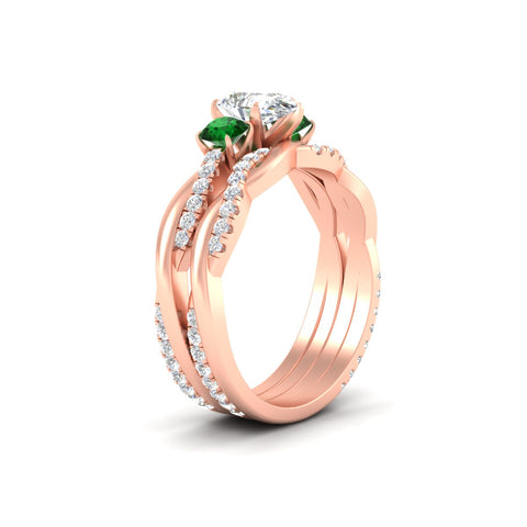 pear-shaped-three-stone-twisted-emerald-wedding-band-in-rose-gold-fdens3301pegemgrangle2-nl-rg.jpg