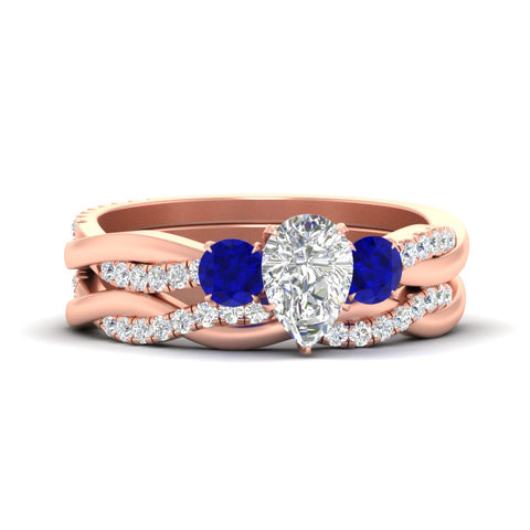 pear-shaped-three-stone-twisted-sapphire-wedding-band-in-rose-gold-fdens3301pegsablsleep-nl-rg.jpg