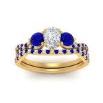 Load image into Gallery viewer, pear-shaped-twisted-floral-prong-sapphire-wedding-set-in-yellow-gold-FD10257PEGSABL-ANGLE5-NL-YG?v=1756360036
