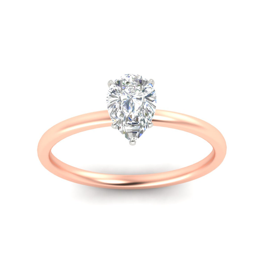 pear-shaped-two-tone-1.5-mm-comfort-fit-solitaire-ring-in-rose-gold-fdens11590perangle5-1.50mm-nl-rg_e0fa6de7-b099-41aa-a912-f67edbcb4d4a?v=1758104238