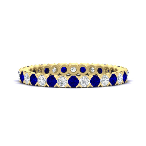 perfect-bezel-set-0.90-carat-round-diamond-and-sapphire-eternity-wedding-band-in-yellow-gold-FD8072ROBGSABL-0.90CT-NL-YG?v=1751956595