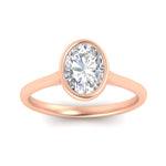 Load image into Gallery viewer, Oval Shaped Petite Bezel Solitaire Engagement Ring

