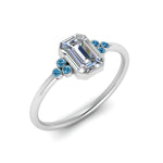 Load image into Gallery viewer, petite-bezel-set-emerald-cut-diamond-engagement-ring-with-blue-topaz-in-white-gold-FD9175EMRGICBLTOANGLE2-NL-WG
