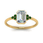Load image into Gallery viewer, petite-bezel-set-emerald-cut-diamond-engagement-ring-with-emerald-in-yellow-gold-FD9175EMRGEMGRANGLE5-NL-YG
