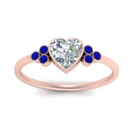 Load image into Gallery viewer, petite-bezel-set-heart-shaped-diamond-engagement-ring-with-sapphire-in-rose-gold-FD9175HTRGSABLANGLE5-NL-RG
