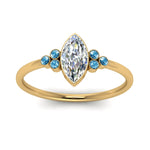 Load image into Gallery viewer, petite-bezel-set-marquise-cut-diamond-engagement-ring-with-blue-topaz-in-yellow-gold-FD9175MQRGICBLTOANGLE5-NL-YG
