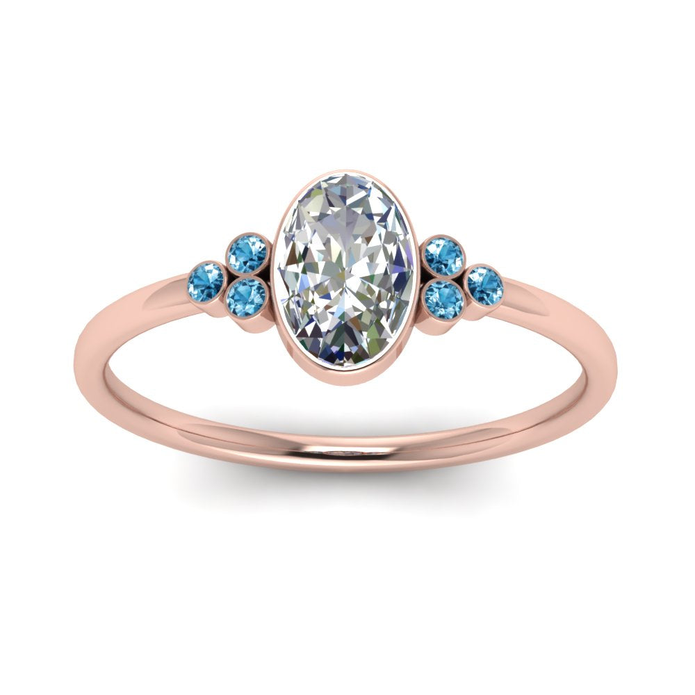 petite-bezel-set-oval-shaped-diamond-engagement-ring-with-blue-topaz-in-rose-gold-FD9175OVRGICBLTOANGLE5-NL-RG