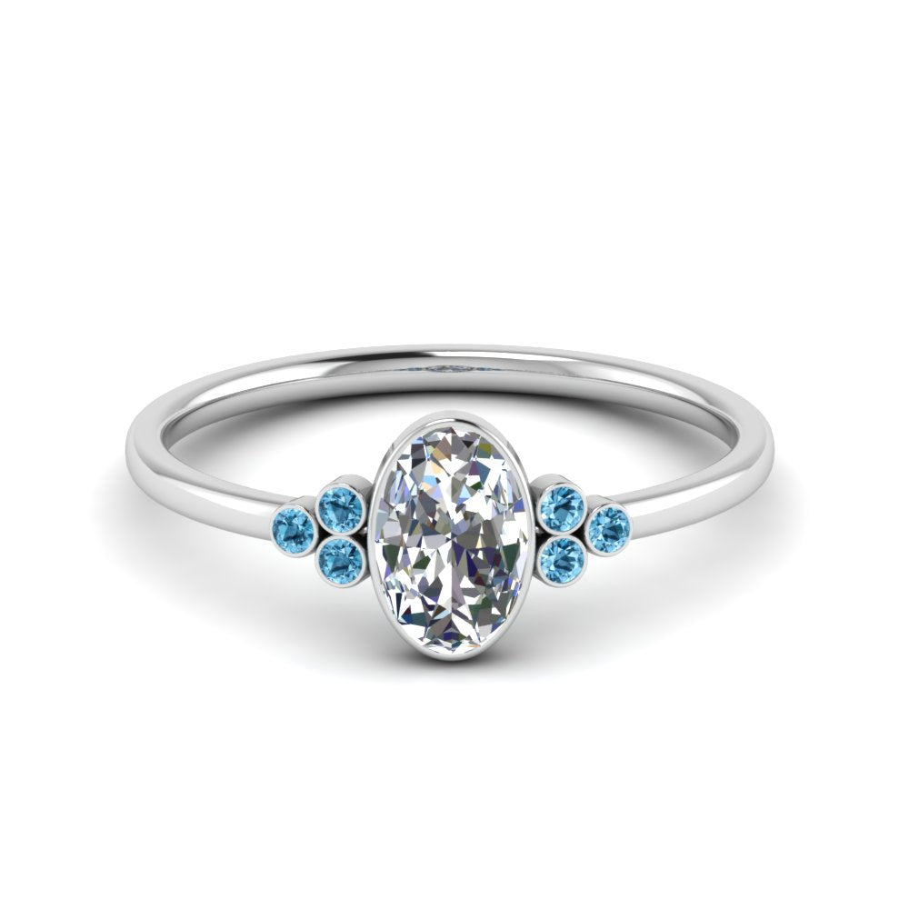 petite-bezel-set-oval-shaped-diamond-engagement-ring-with-blue-topaz-in-white-gold-FD9175OVRGICBLTO-NL-WG