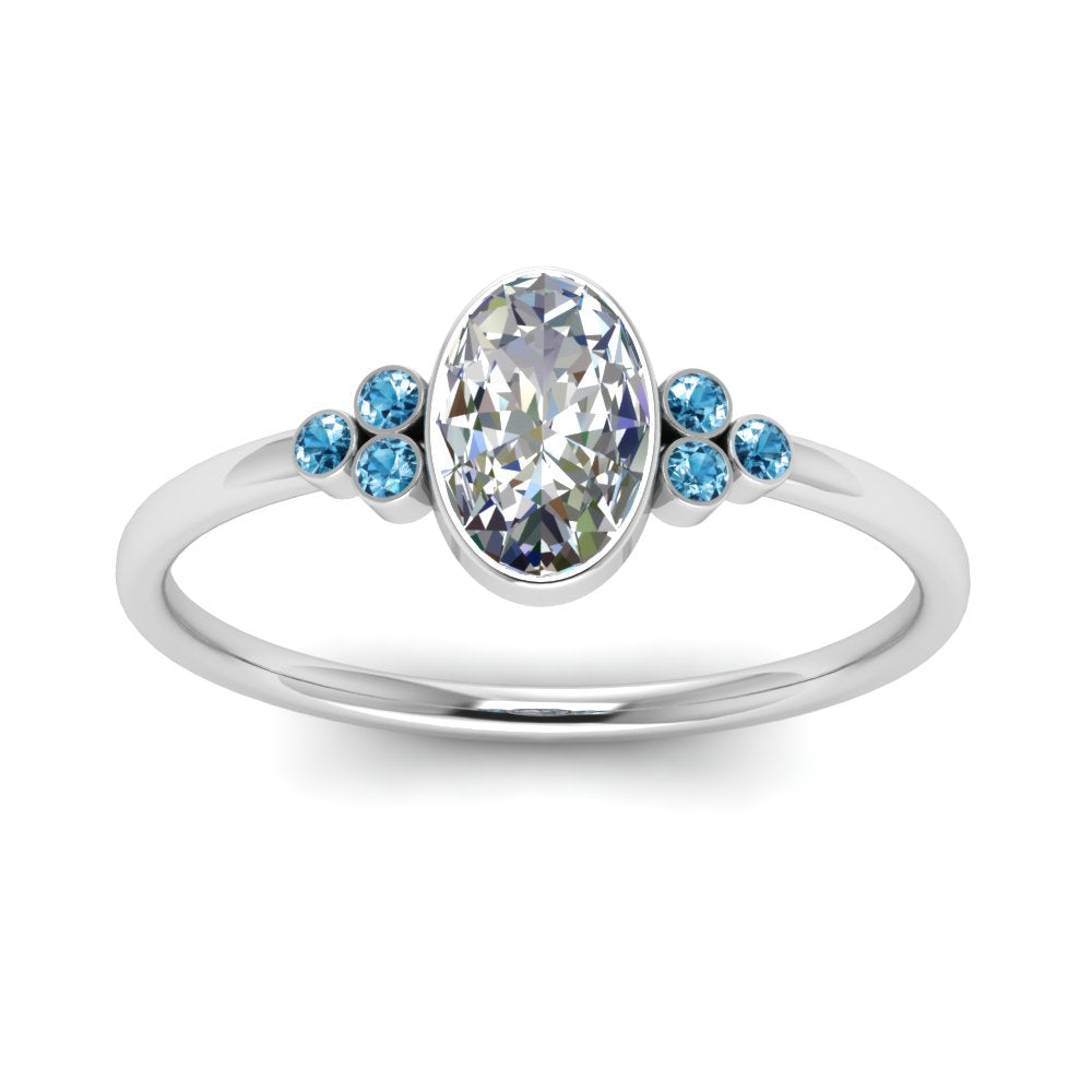petite-bezel-set-oval-shaped-diamond-engagement-ring-with-blue-topaz-in-white-gold-FD9175OVRGICBLTOANGLE5-NL-WG