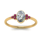 Load image into Gallery viewer, petite-bezel-set-oval-shaped-diamond-engagement-ring-with-pink-sapphire-in-yellow-gold-FD9175OVRGSADRPIANGLE5-NL-YG

