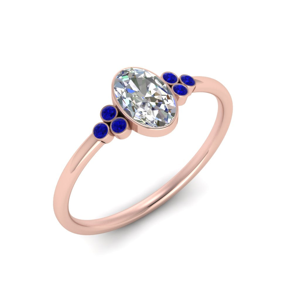 petite-bezel-set-oval-shaped-diamond-engagement-ring-with-sapphire-in-rose-gold-FD9175OVRGSABLANGLE2-NL-RG