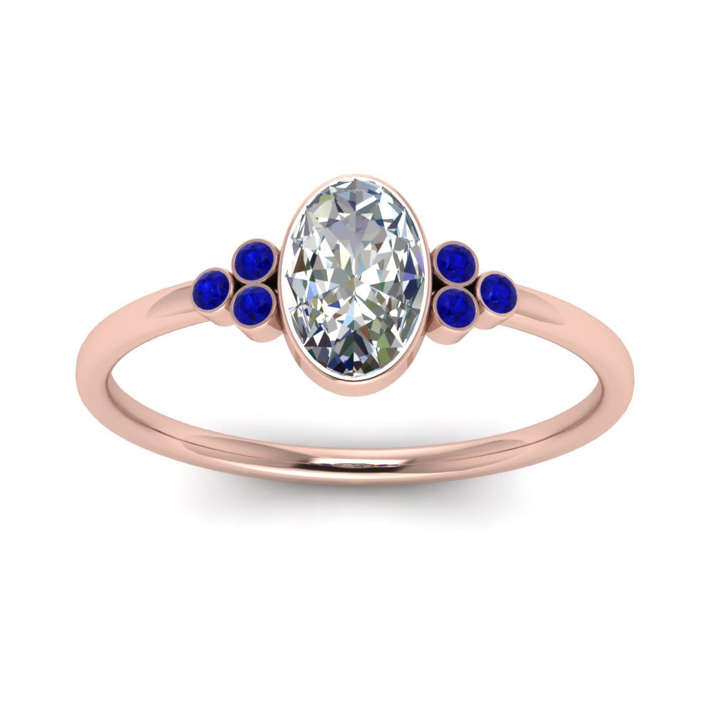 petite-bezel-set-oval-shaped-diamond-engagement-ring-with-sapphire-in-rose-gold-FD9175OVRGSABLANGLE5-NL-RG