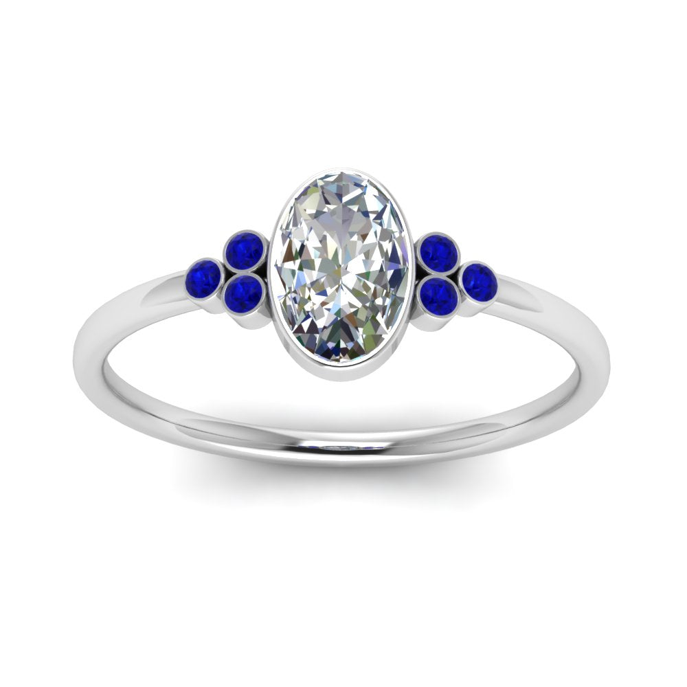 petite-bezel-set-oval-shaped-diamond-engagement-ring-with-sapphire-in-white-gold-FD9175OVRGSABLANGLE5-NL-WG