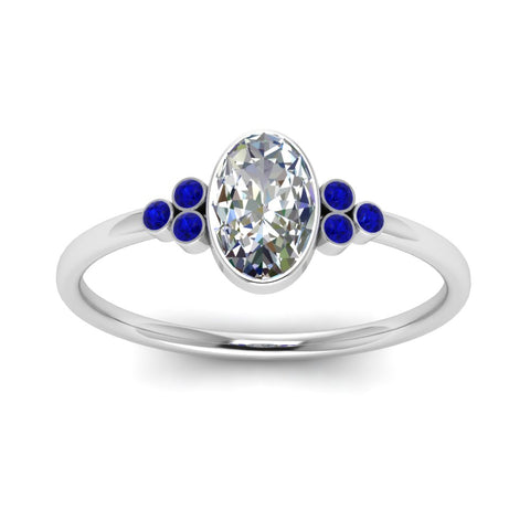 petite-bezel-set-oval-shaped-diamond-engagement-ring-with-sapphire-in-white-gold-FD9175OVRGSABLANGLE5-NL-WG