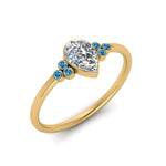 Load image into Gallery viewer, petite-bezel-set-pear-shaped-diamond-engagement-ring-with-blue-topaz-in-yellow-gold-FD9175PERGICBLTOANGLE2-NL-YG

