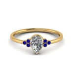 Load image into Gallery viewer, petite-bezel-set-pear-shaped-diamond-engagement-ring-with-sapphire-in-yellow-gold-FD9175PERGSABL-NL-YG
