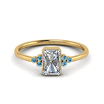 Load image into Gallery viewer, petite-bezel-set-radiant-cut-diamond-engagement-ring-with-blue-topaz-in-yellow-gold-FD9175RARGICBLTO-NL-YG
