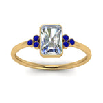 Load image into Gallery viewer, petite-bezel-set-radiant-cut-diamond-engagement-ring-with-sapphire-in-yellow-gold-FD9175RARGSABLANGLE5-NL-YG
