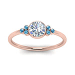 Load image into Gallery viewer, petite-bezel-set-round-cut-diamond-engagement-ring-with-blue-topaz-in-rose-gold-FD9175RORGICBLTOANGLE5-NL-RG
