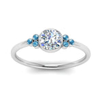 Load image into Gallery viewer, petite-bezel-set-round-cut-diamond-engagement-ring-with-blue-topaz-in-white-gold-FD9175RORGICBLTOANGLE5-NL-WG

