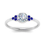 Load image into Gallery viewer, petite-bezel-set-round-cut-diamond-engagement-ring-with-sapphire-in-white-gold-FD9175RORGSABLANGLE5-NL-WG
