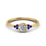 Load image into Gallery viewer, petite-bezel-set-round-cut-diamond-engagement-ring-with-sapphire-in-yellow-gold-FD9175RORGSABL-NL-YG
