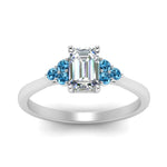 Load image into Gallery viewer, petite-cathedral-emerald-cut-diamond-engagement-ring-with-blue-topaz-in-white-gold-FD9275EMRGICBLTOANGLE5-NL-WG_1142dc25-8a13-4dd8-94d7-51d6674bf184?v=1758264057
